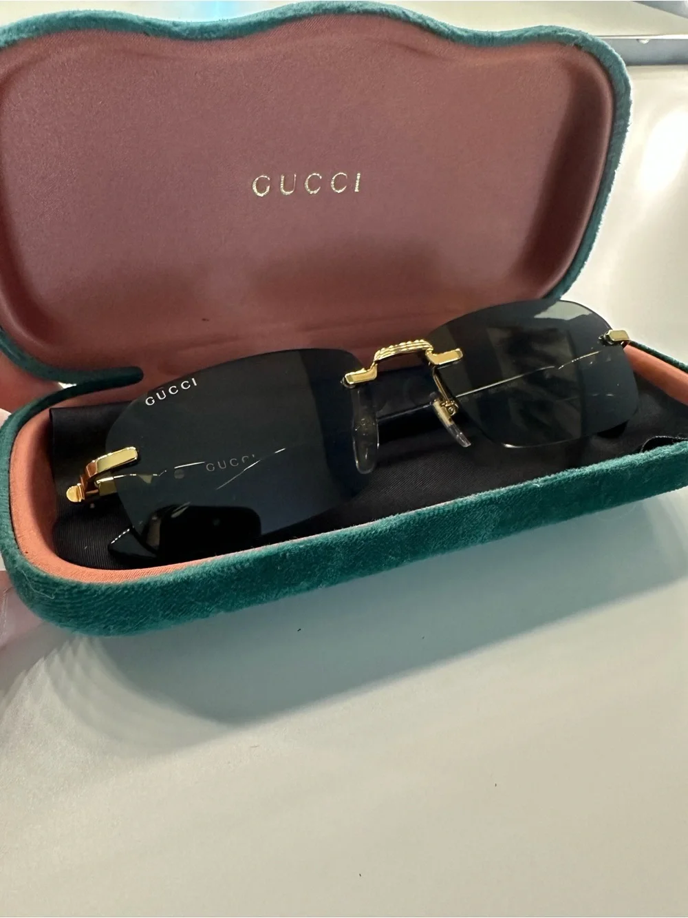 Gucci Men’s Rimless Sunglasses - Black and Gold